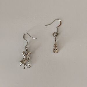 mismatched charm earring set.
